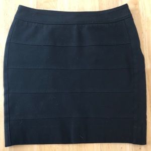 NWOT black mini skirt in perfect condition